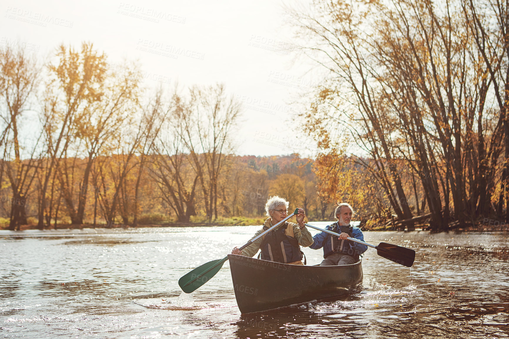 Buy stock photo Lake, senior couple and kayaking in nature with canoe for explore, adventure or retirement activity. Outdoor, river and elderly woman with man on boat for rowing, holiday or weekend break in Sydney