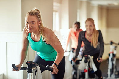 Buy stock photo Woman, exercise bike and coach at gym, training and cycling for fitness or spin class. Female person, riding and stationary machine for workout challenge, aerobic instructor and equipment for cardio