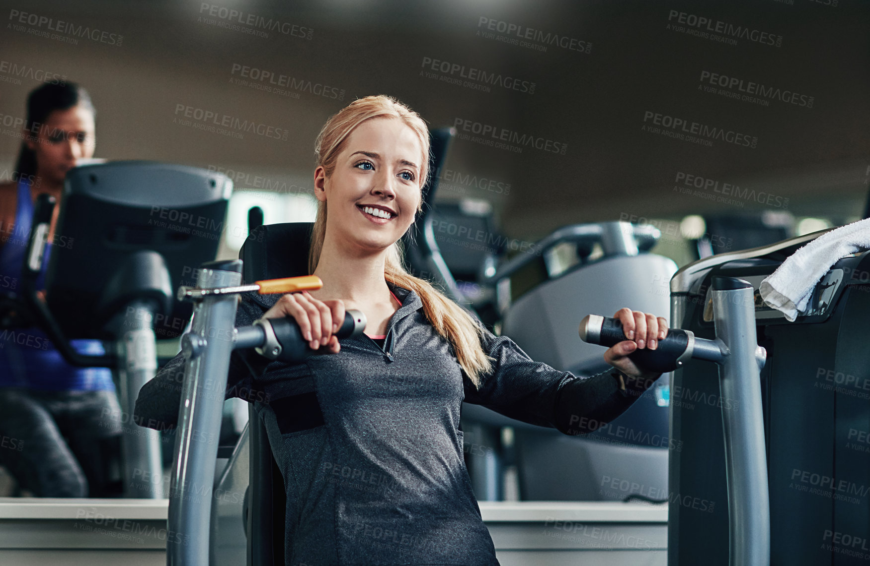 Buy stock photo Gym, woman and smile on chest press machine for workout to exercise for health, fitness and muscles. Female person, happy and satisfied with training for wellbeing, wellness and self care in routine