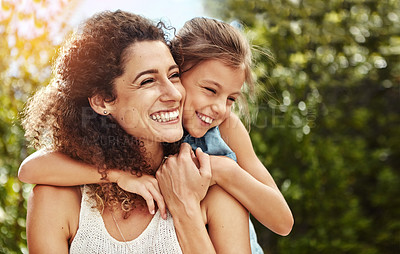 Buy stock photo Shot of a mother and her little girl spending some time together outdoors