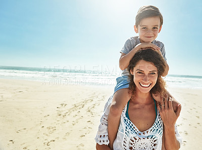 Buy stock photo Portrait of a mother and her little son enjoying some quality time together at the beach