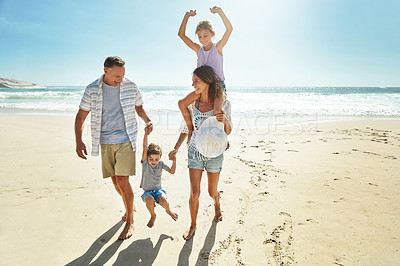 Buy stock photo Parents, children and swing on beach holiday for travel sunshine, ocean piggy back or sibling development. Man, woman and kid playful on sand for vacation walk or outdoor, sea relax or love nature