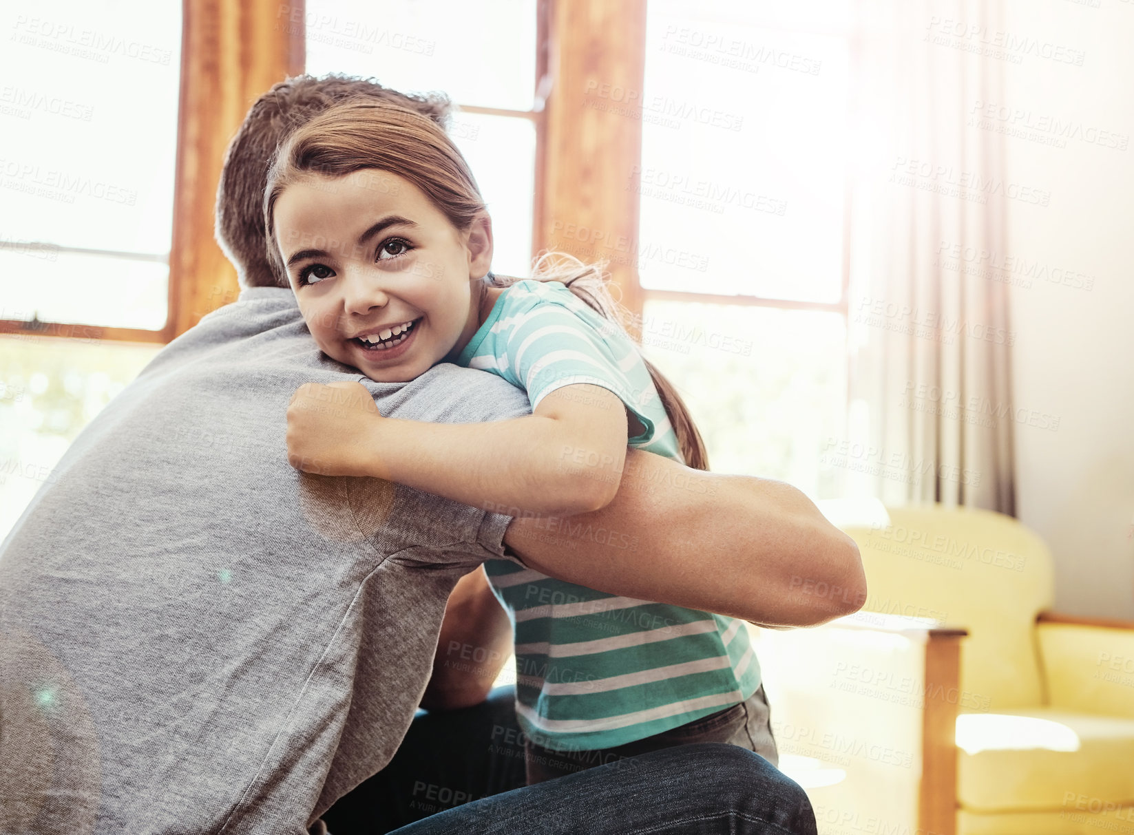 Buy stock photo Happy, girl and dad on hug in home for fun with support, care and love in living room. People, smile and family together for bonding, comfort and embrace for child development and growth with kid