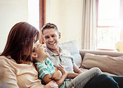 Buy stock photo Shot of a family bonding together at home