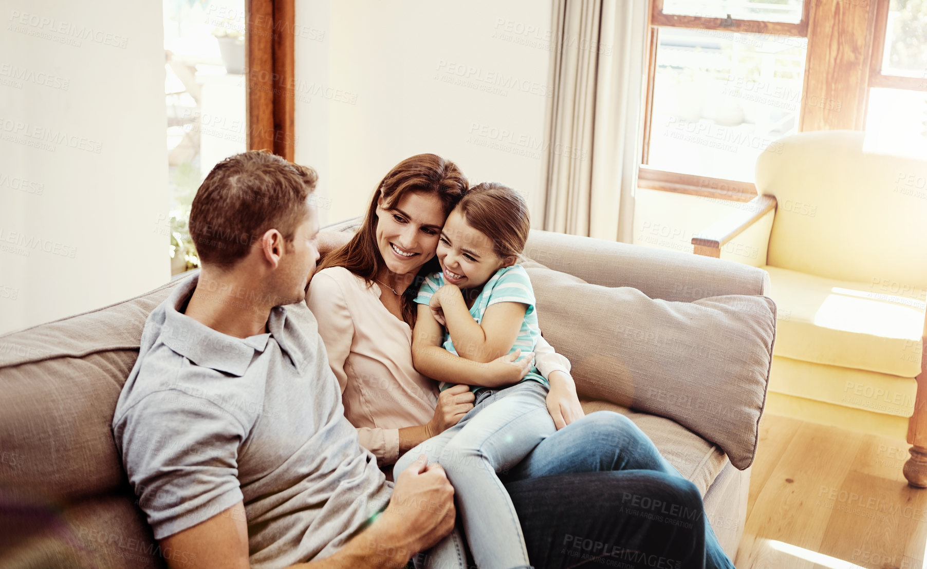 Buy stock photo Shot of a family bonding together at home