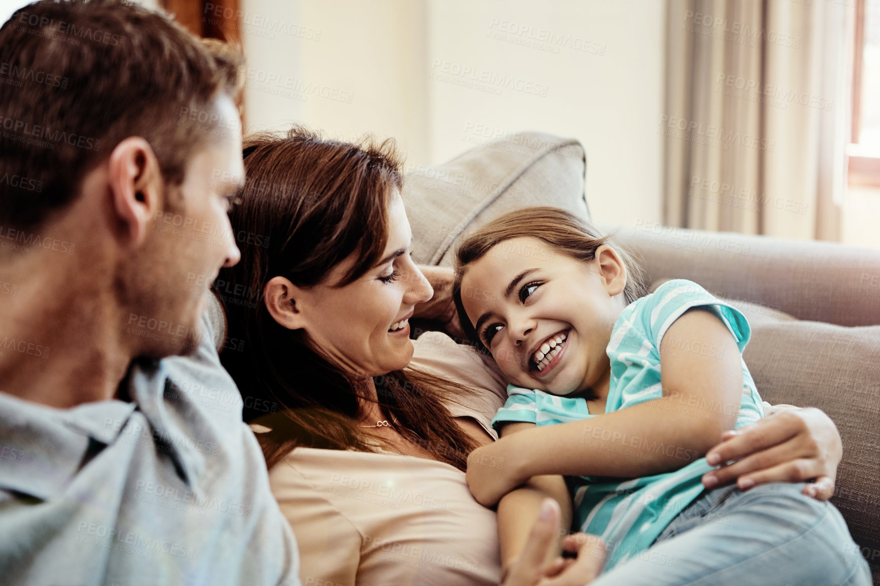 Buy stock photo Shot of a family bonding together at home