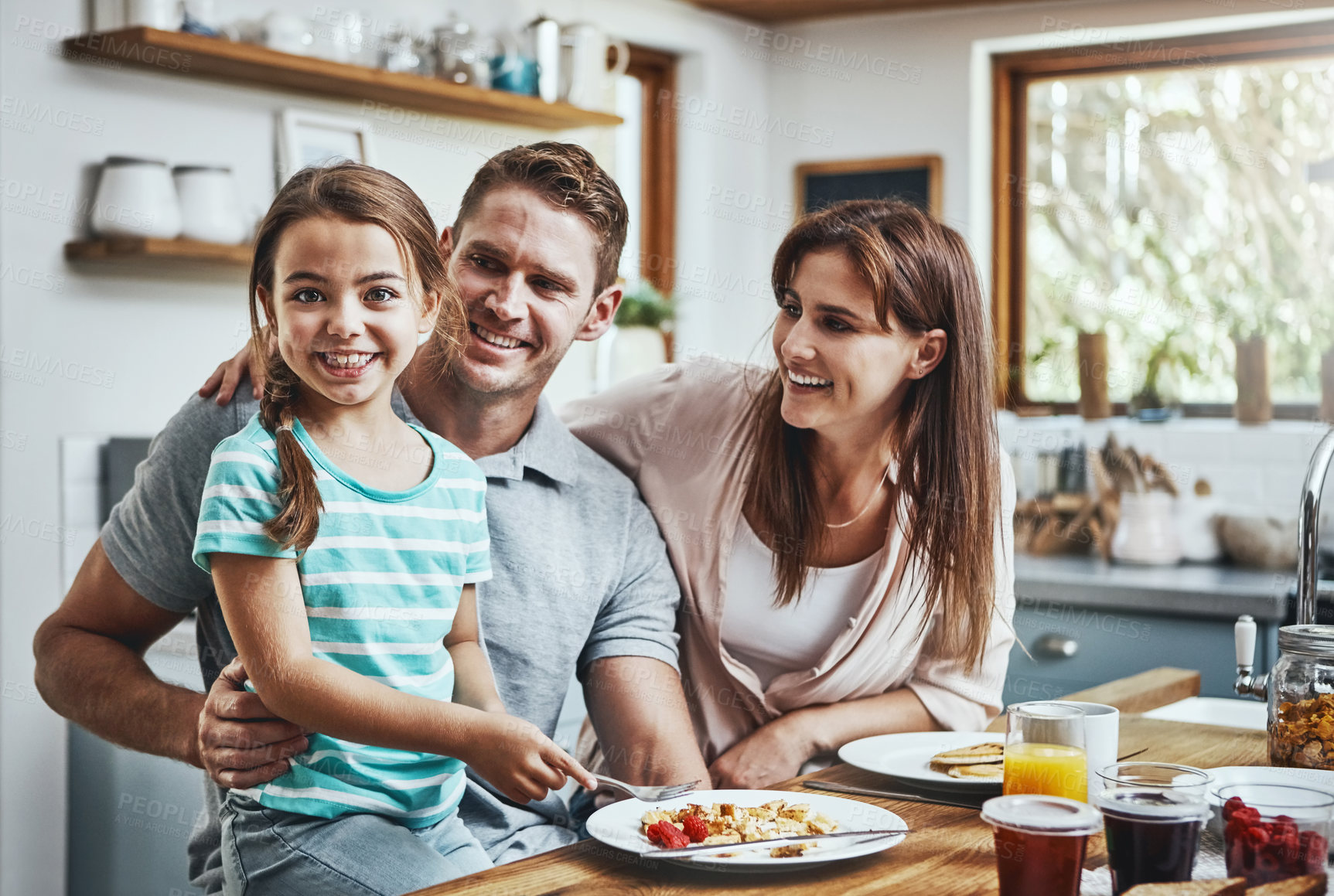 Buy stock photo Portrait, breakfast meal and happy family with children, mother and father, bonding and prepare ingredients. Morning food, cooking and hungry woman, man and daughter in home kitchen eating pancakes