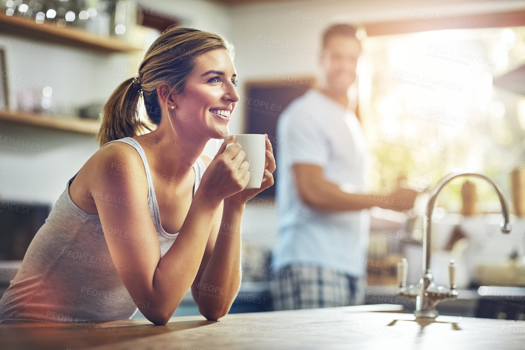 Buy stock photo Woman, coffee and thinking in morning in kitchen for daily breakfast routine, peace and calm for comfort. Girl, beverage and thoughts in home with man or quiet moment, contemplation and mindfulness.