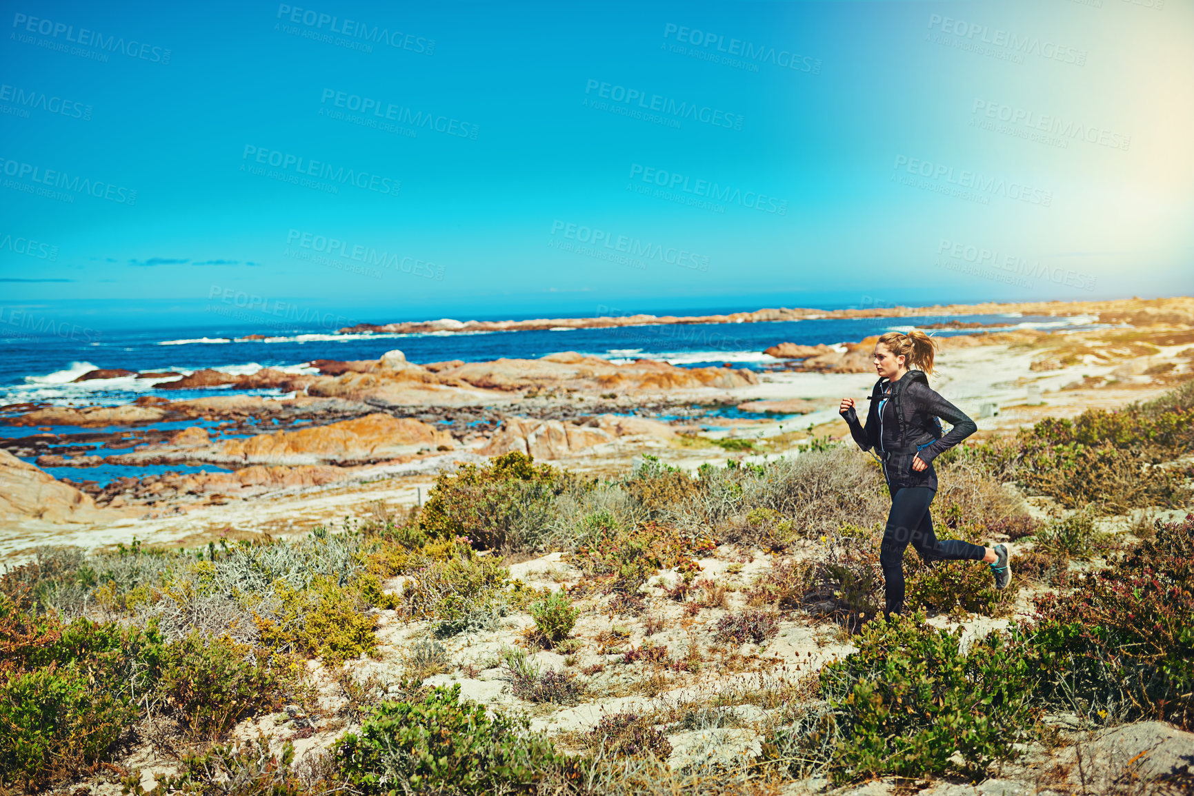 Buy stock photo Woman running, beach and fitness outdoor with cardio and training for marathon with young athlete and sports. Female runner in nature, ocean and run for exercise with healthy person and mockup space