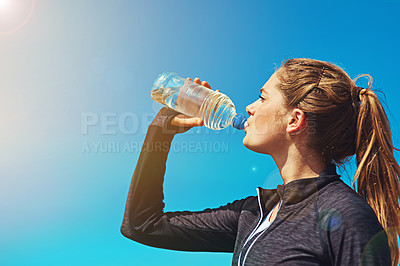 Buy stock photo Woman drinking water, health and fitness with blue sky, athlete outdoor with hydration and mockup space. Sports, exercise and female person with h2o drink in bottle, workout and break from training
