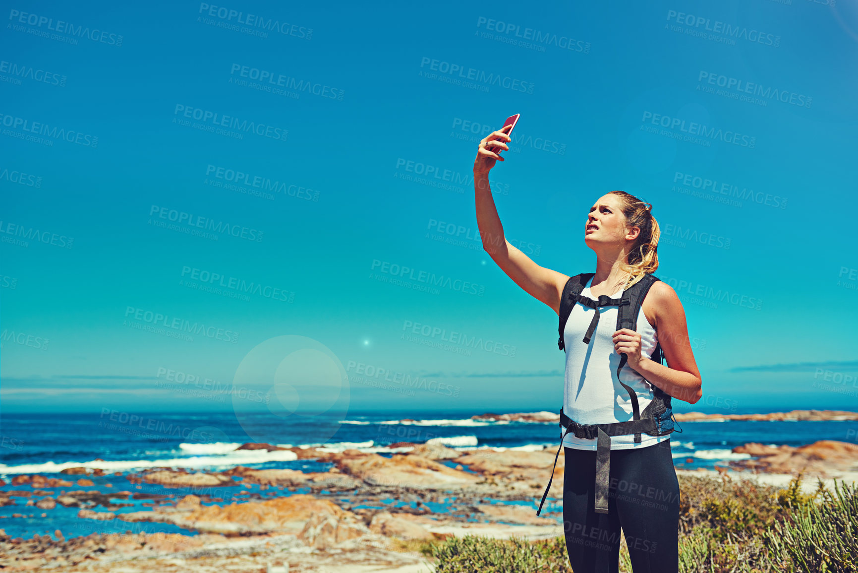 Buy stock photo No signal, phone and woman on ocean space for navigation, connectivity and fitness. Lost, athlete and mobile in nature for location, tracking and error on network provider with worry for crisis