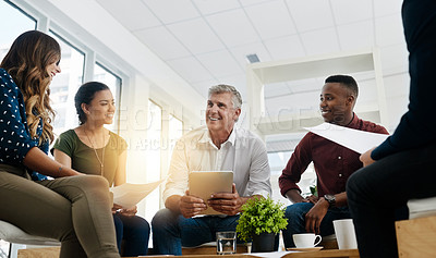 Buy stock photo Shot of creative employees working in a modern office