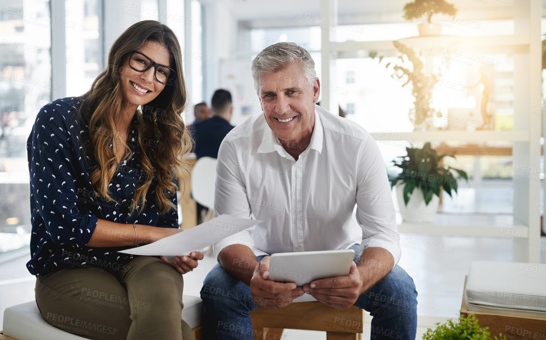 Buy stock photo Shot of creative employees working in a modern office