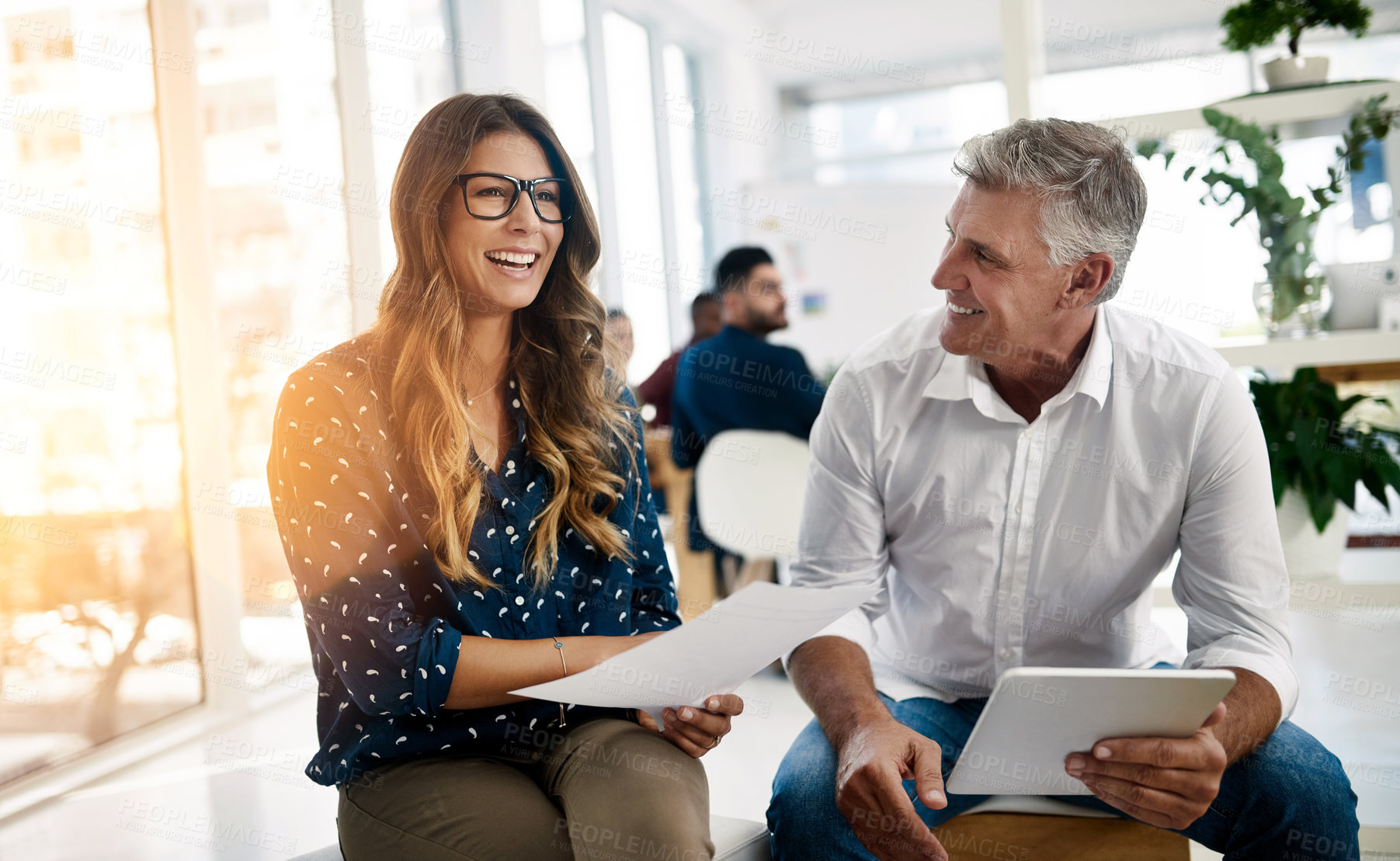 Buy stock photo Shot of creative employees working in a modern office