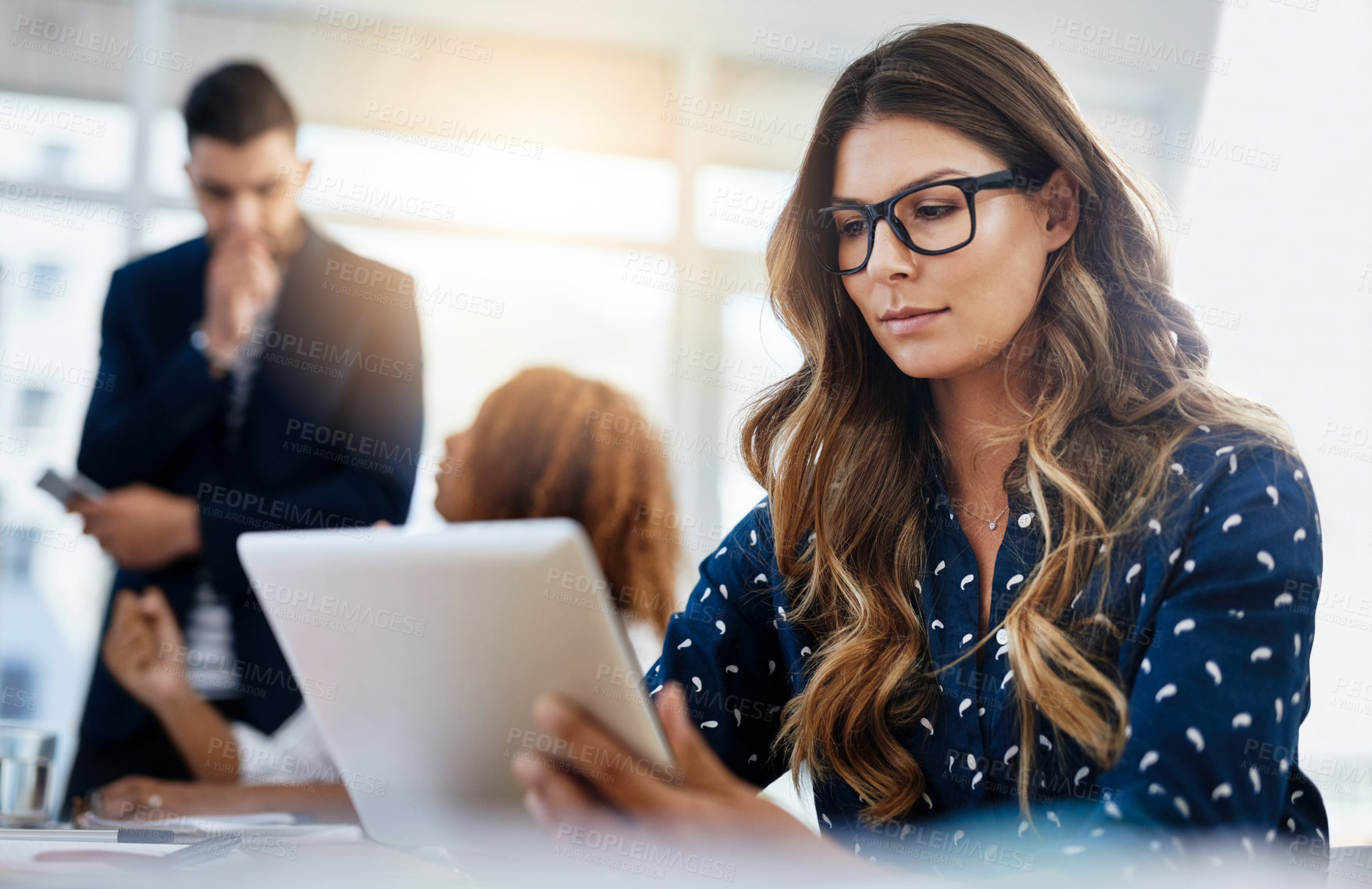 Buy stock photo Shot of creative employees working in a modern office