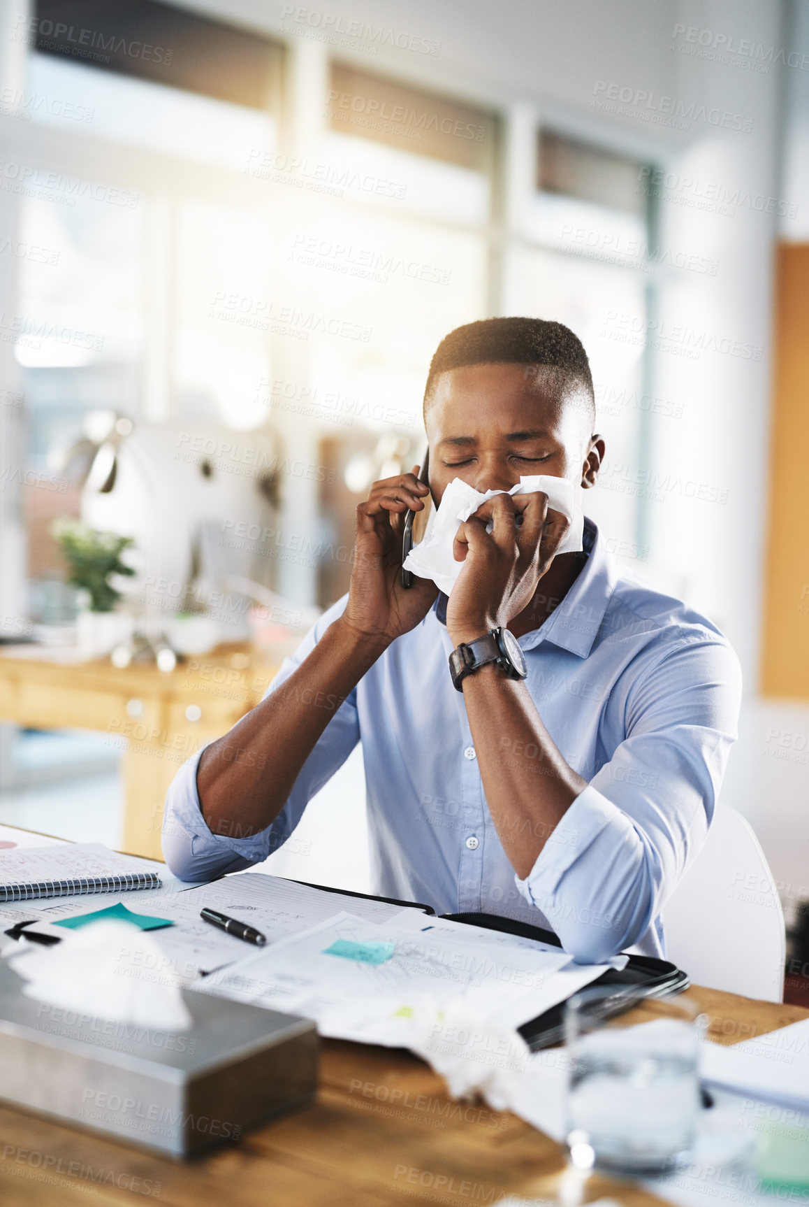 Buy stock photo Man, working and blowing nose in office with tissue for healthcare, flu infection or FLiRT Covid. Male person, company or virus with sick with bacteria, employee with allergy at desk for medical