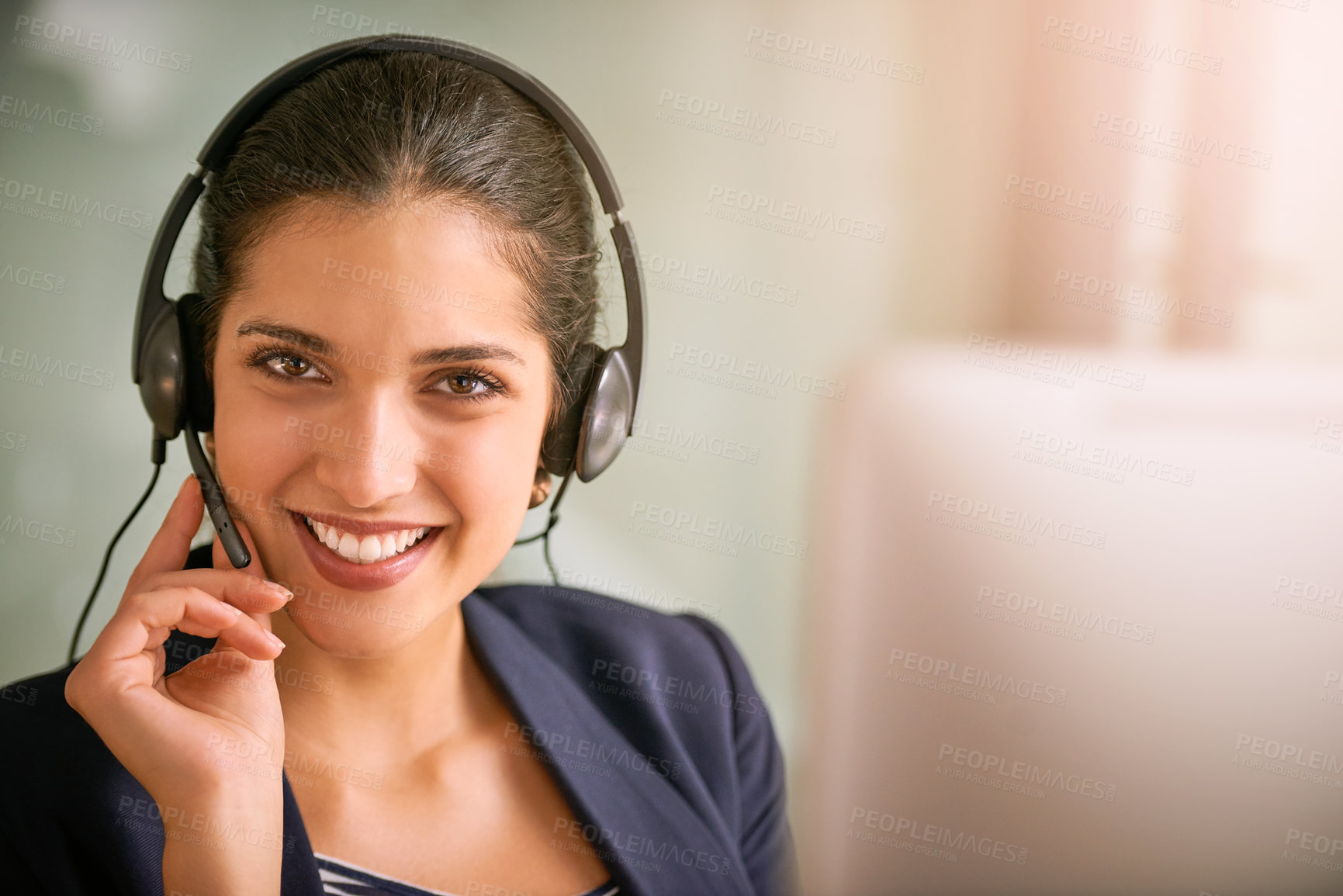 Buy stock photo Cropped portrait of an attractive young woman working in a call center