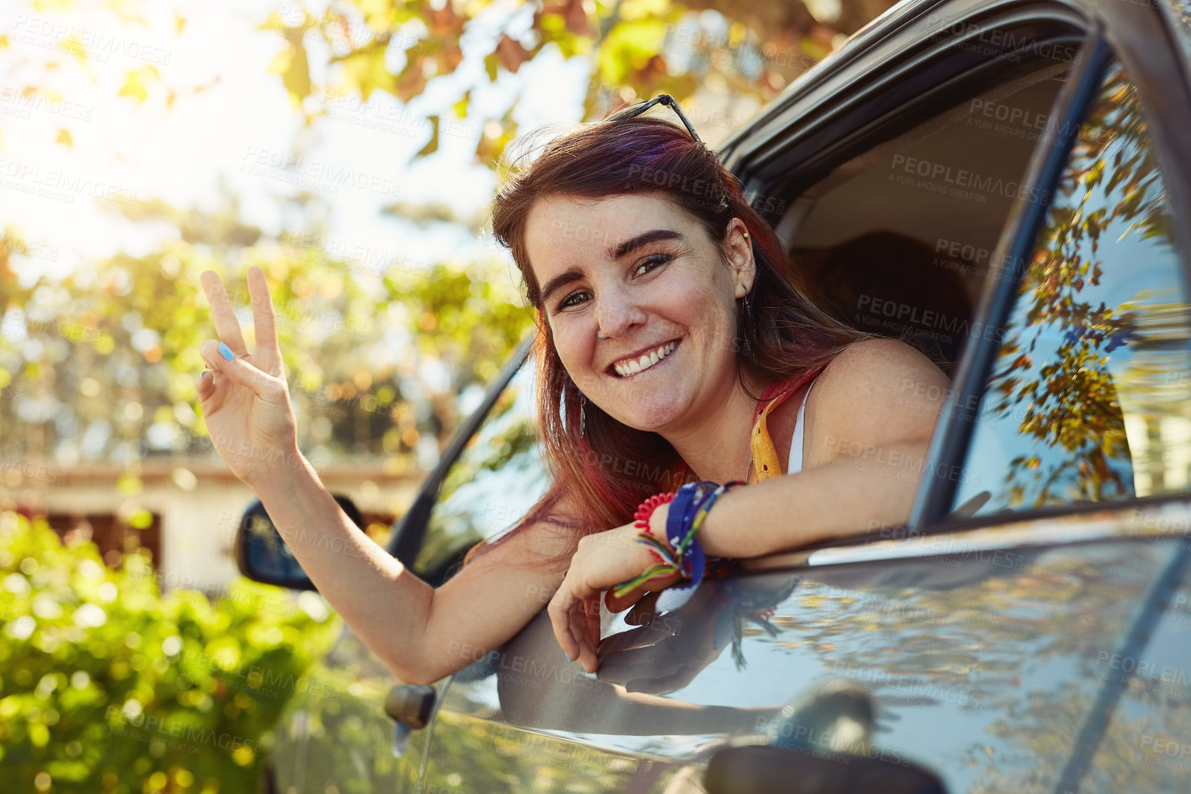 Buy stock photo Portrait, peace sign and happy woman in car for road trip with smile, adventure and summer travel. Tourist girl, backseat and female person in motor for vacation with hand gesture, window and journey