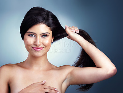 Buy stock photo Hair, beauty and portrait of woman in studio happy for haircare, healthy texture and growth. Salon, wellness and person with smile for keratin treatment, cosmetics and shampoo on blue background