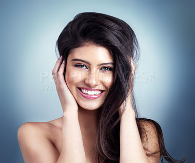 Buy stock photo Portrait, hair care and woman with shine, beauty and growth on blue studio background. Face, person and model with grooming routine, salon treatment and keratin with shampoo, glow and dermatology