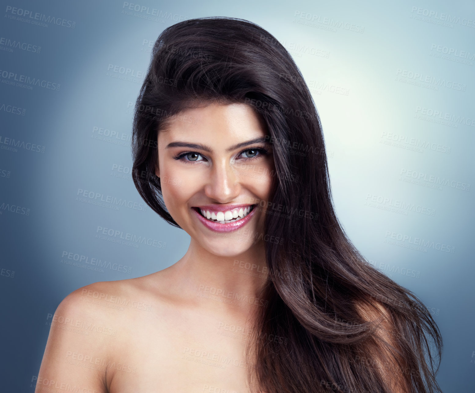 Buy stock photo Woman, smile and portrait in studio for skincare, beauty and spa treatment on blue background. Girl, happy and confidence with healthy skin, self care and hair wellness with facial transformation