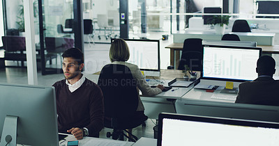 Buy stock photo High angle shot of corporate businesspeople working in their office
