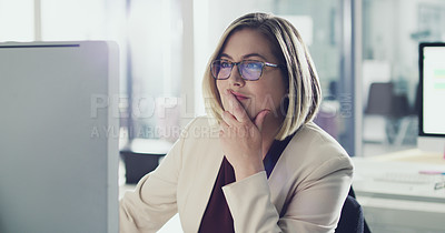 Buy stock photo Cropped shot of an attractive businesswoman working on her computer in the office