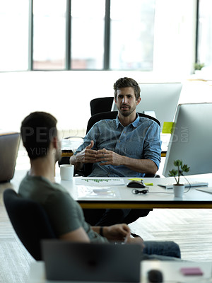 Buy stock photo Businessman, startup partnership and talking friends at desk with collaboration, advice or planning at workplace. Entrepreneur group, teamwork and chat in office with support, vision or company goals