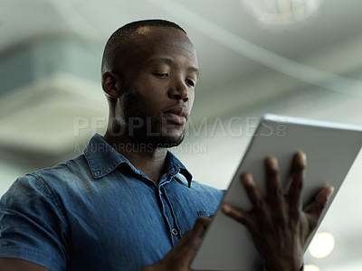 Buy stock photo Technology, communication and black man with tablet reading email, sales news or global networking. Research, company leader with vision and online administration in b2b management at startup office.