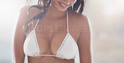 Buy stock photo Cropped shot of an unrecognizable young woman posing in a sexy bra