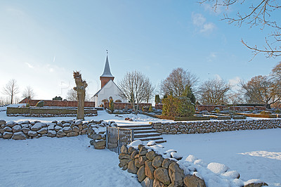 Buy stock photo Snow, garden and estate with gate, rocks or blue sky in nature for winter, climate change or rural infrastructure. Landscape, building or architecture with natural scenery or growth in scandinavia