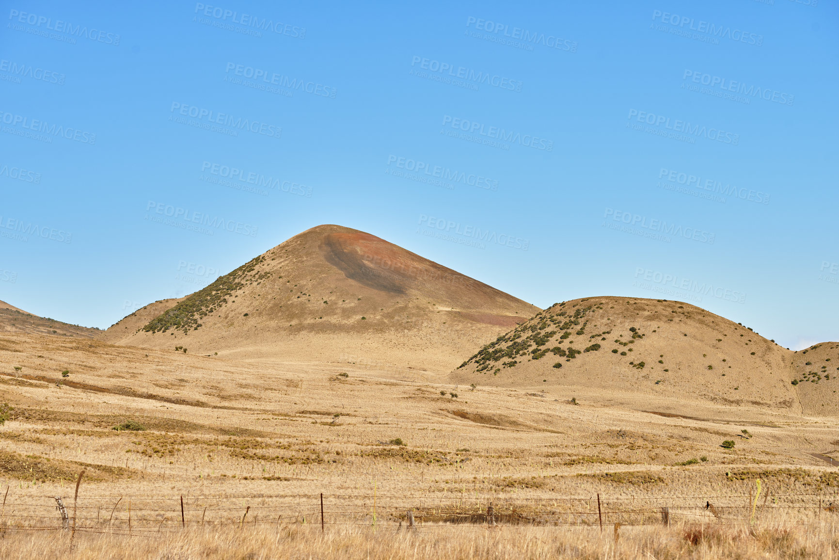 Buy stock photo Environment, landscape and mountain with terrain hill for Hawaii adventure, conservation or hiking. Blue sky, ecology and nature with dry valley in morning for discovery, exploration or journey