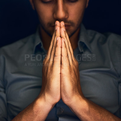 Buy stock photo God, worship and man with hands praying for help, hope and guidance in dark studio. Pray, thank you and Christian male in prayer for hope, gratitude and holy praise, faith or blessing to Jesus Christ