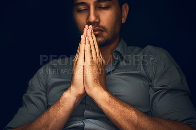 Buy stock photo Pray, worship and man with praying hands in studio for hope, faith and religious guidance. Palms, prayer and male person with gesture for faith, God and gratitude to Jesus for help, trust and belief