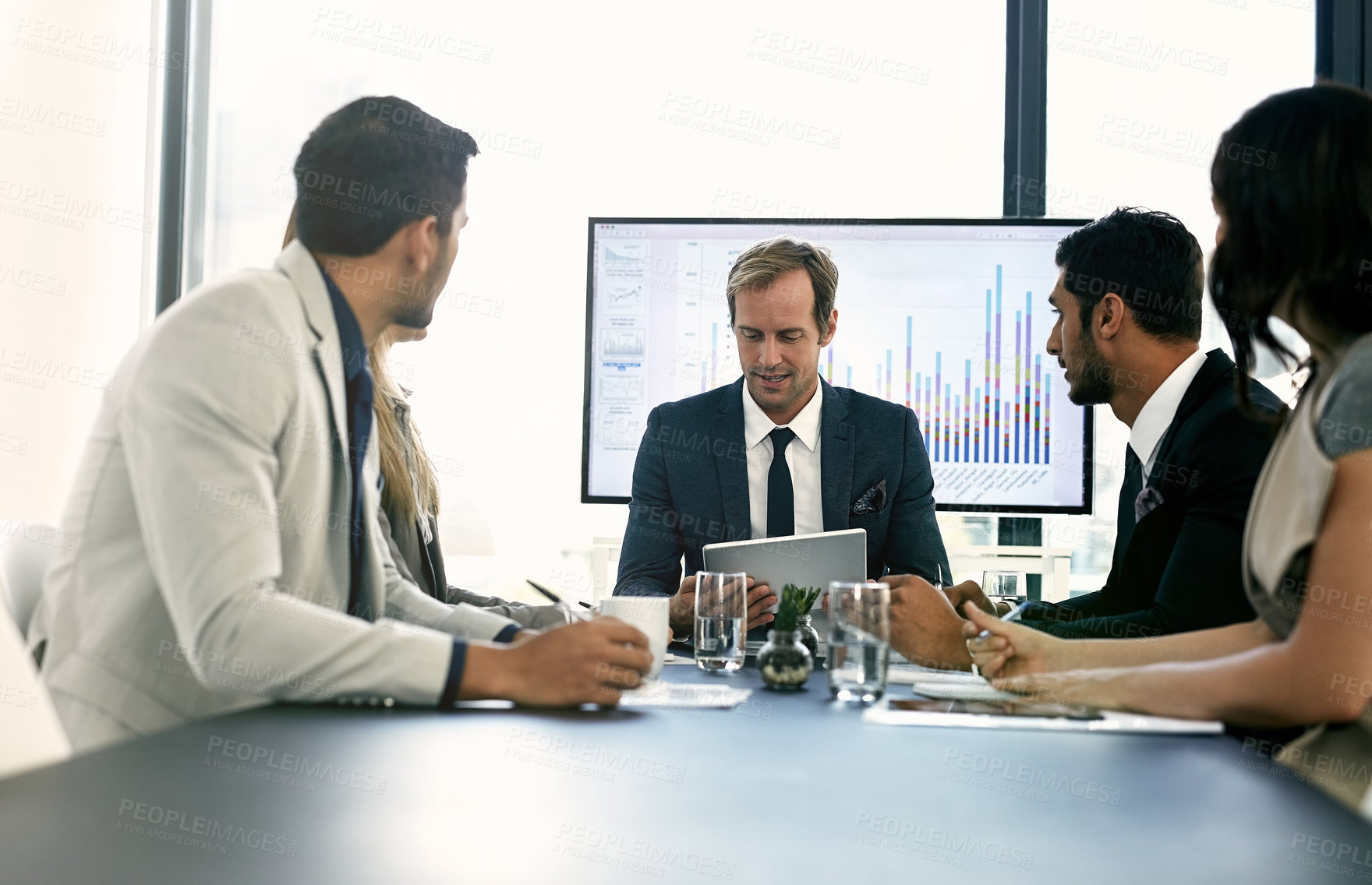 Buy stock photo Meeting, team and business people in office with tablet for planning corporate investment strategy. Discussion, group and financial advisors with company stocks, trading or profit growth in workplace