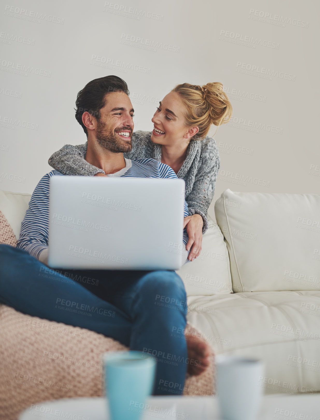 Buy stock photo Happy couple, laughing or laptop for support, space and movie streaming online in house living room. Smile, internet and people bonding on social network app, digital website and technology for news