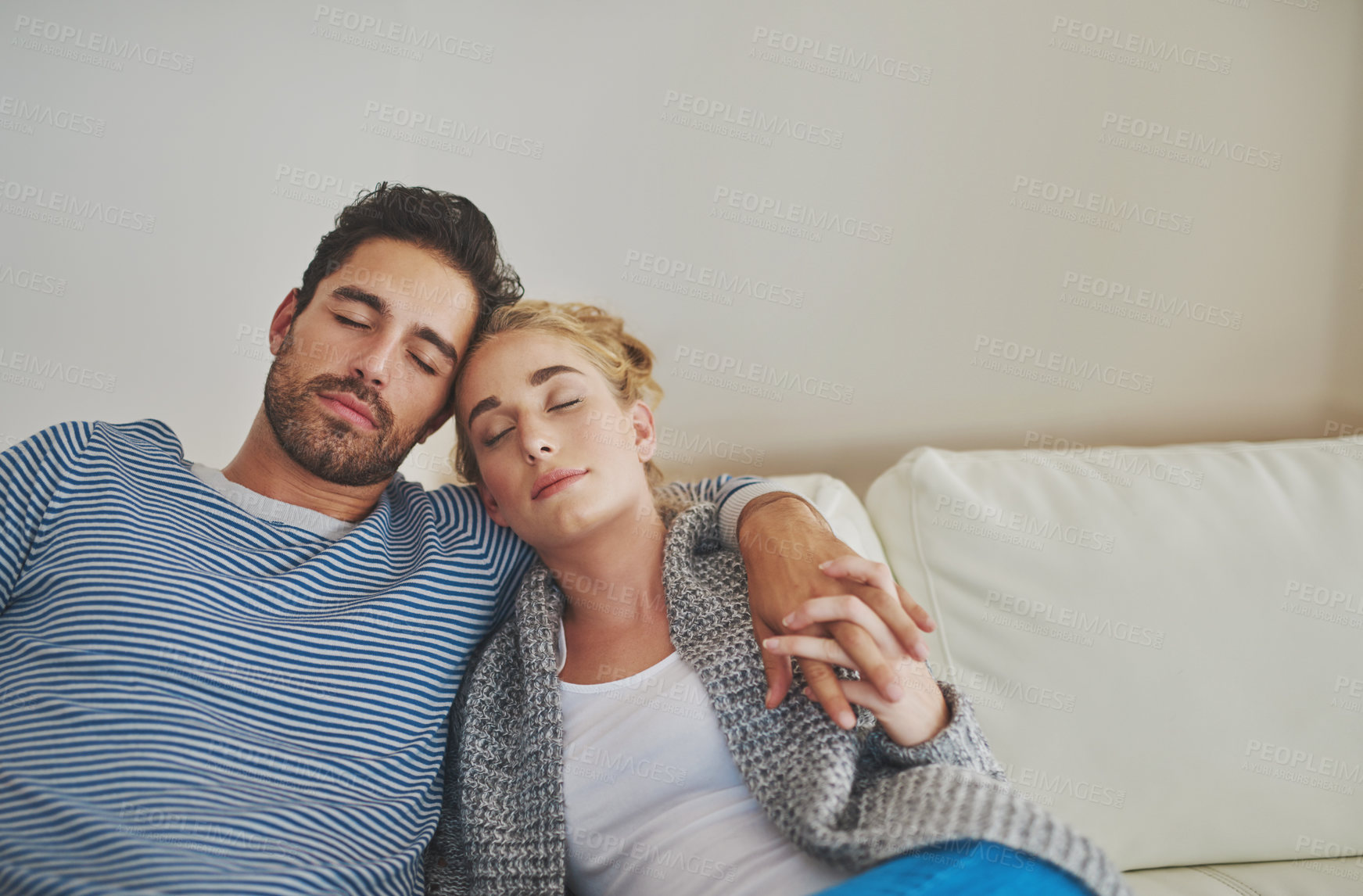 Buy stock photo Comfort, love and sleeping with couple on sofa in living room of home to relax for recovery or rest. Dream, peace or quiet with man and woman in apartment together on weekend morning for nap