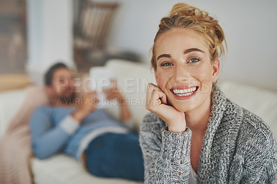 Buy stock photo Portrait, woman and smile in home for comfort, relax and weekend with husband. Housewife, man and happy on sofa for peace, wellness and together in apartment with good mood or bonding in marriage