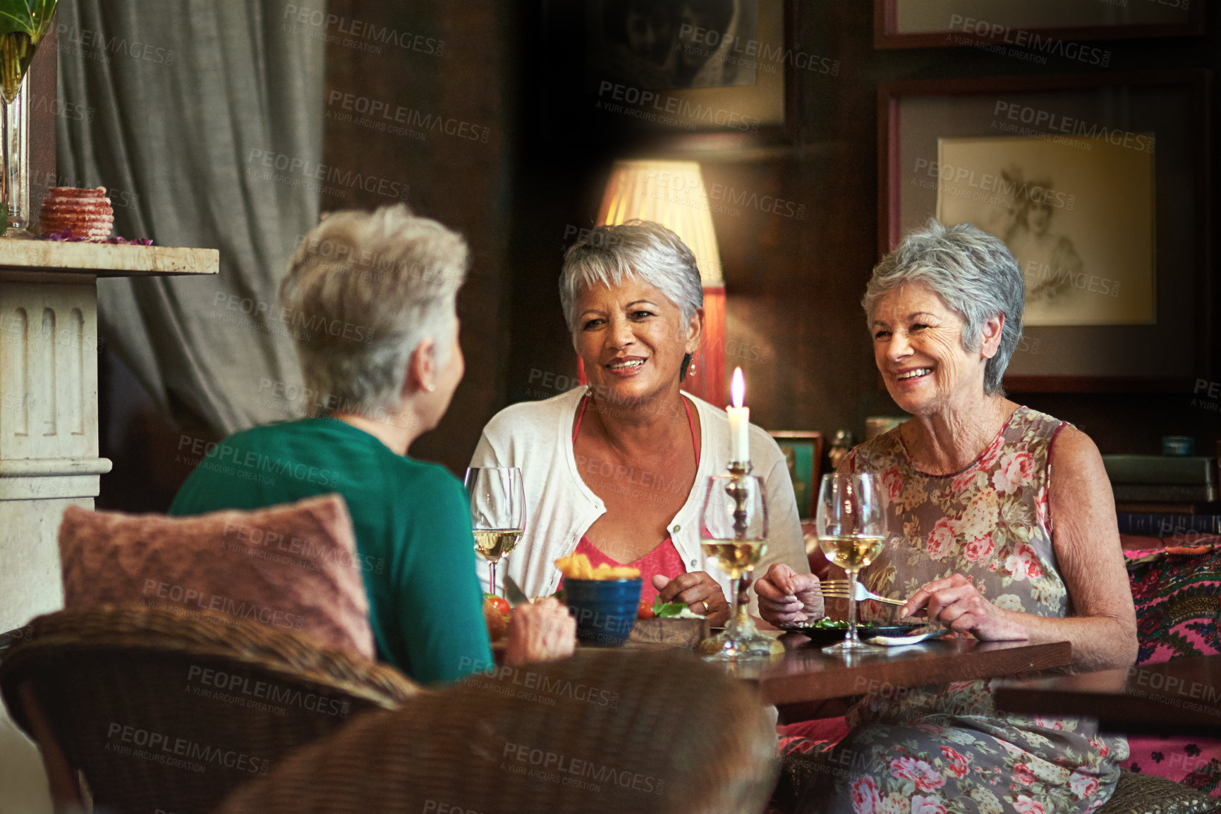 Buy stock photo Cropped shot of a group of senior female friends enjoying a lunch date