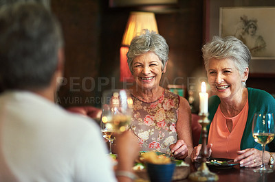 Buy stock photo Cropped shot of a group of senior female friends enjoying a lunch date