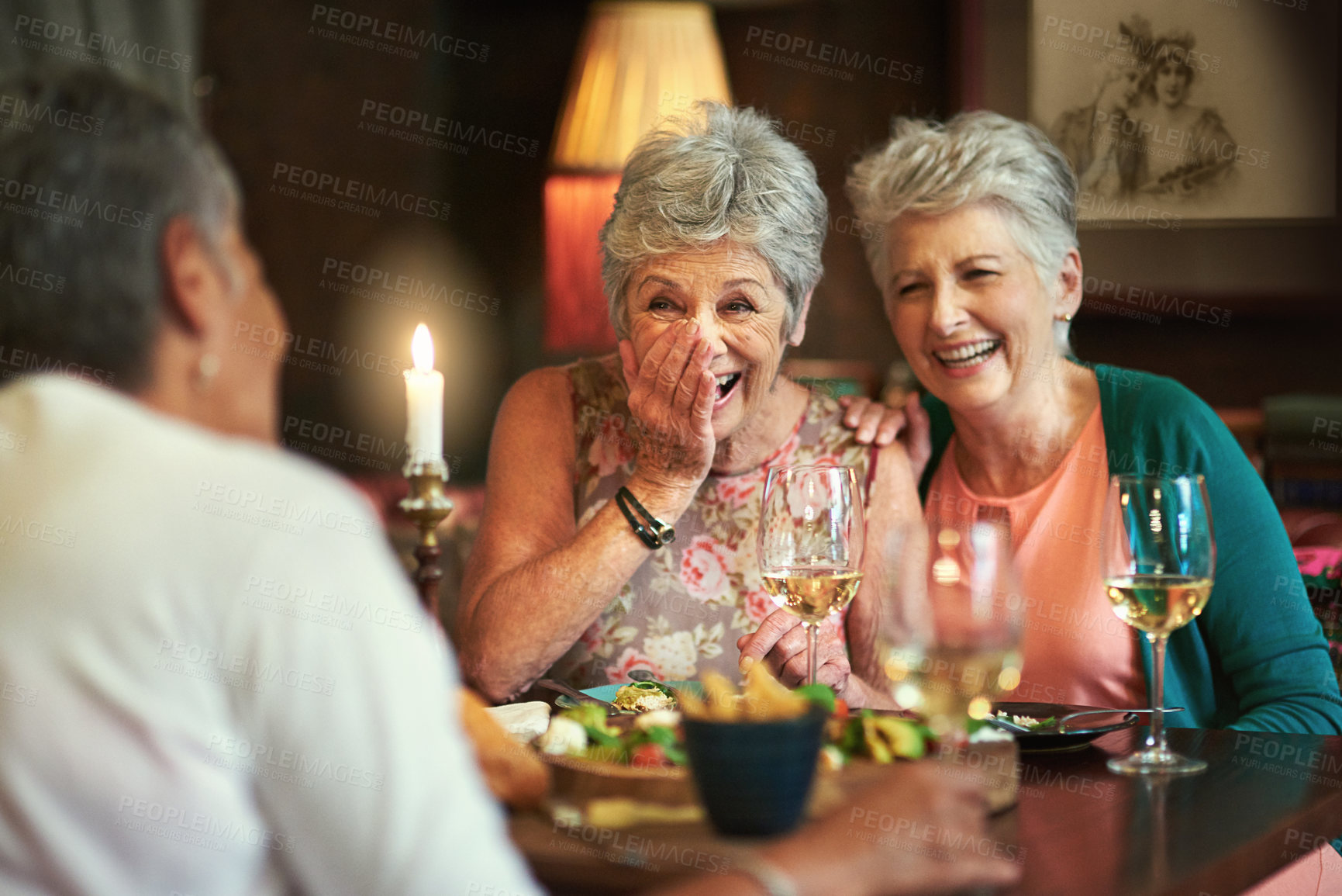 Buy stock photo Cropped shot of a group of senior female friends enjoying a lunch date