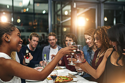 Buy stock photo Friends, party and toast with wine for celebration, new year dinner feast and happy with social gathering and friendship. Men, women and food with alcohol drink, pizza and beer to celebrate together.