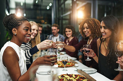 Buy stock photo Food, party and wine with friends at restaurant for celebration, pizza and social event. Happy, diversity and toast with group of people eating together for fine dining, cheers and free time