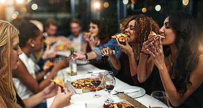 Buy stock photo Pizza, friends and dinner party at a restaurant, celebration and eating together. New years, young people and enjoy food at event, bonding or happy at social gathering while drinking alcohol with fun