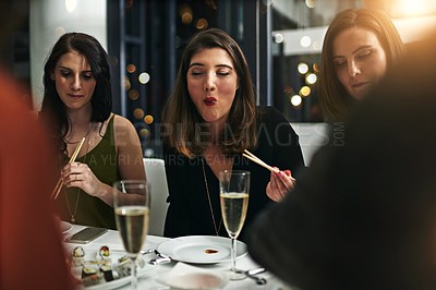 Buy stock photo Friends, dinner party and at a restaurant for celebration, happiness or eating. Young people, women and champagne for event, conversation and alcohol for social gathering, sushi and speaking to relax