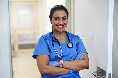 Buy stock photo Portrait of a female surgeon standing in a hospital