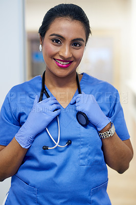 Buy stock photo Portrait of a female surgeon standing in a hospital