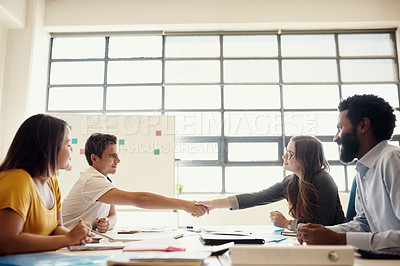 Buy stock photo Business people, smile and handshake by desk for partnership, creative collaboration and success in office. Team meeting, happy and shaking hands for deal negotiation, b2b opportunity and thank you