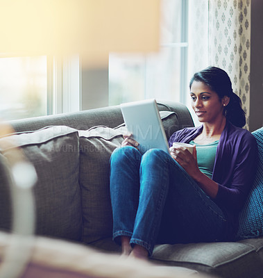 Buy stock photo Woman, home and reading tablet for relax on couch, scroll on internet or social media. Female person, mobile technology and living room with research and happiness, online blog or email communication