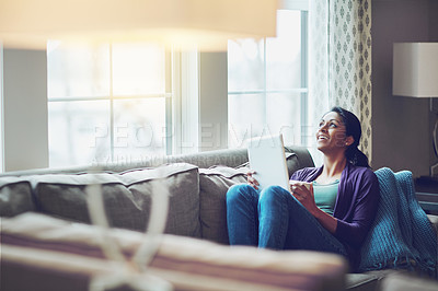 Buy stock photo Thinking, woman and tablet on sofa in home for online conversation, communication and weekend on internet. Happy, female person and technology in living room for entertainment and social media